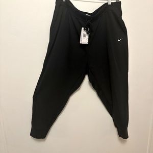 2 pairs Dri-Fit Plus size Nike Joggers.
